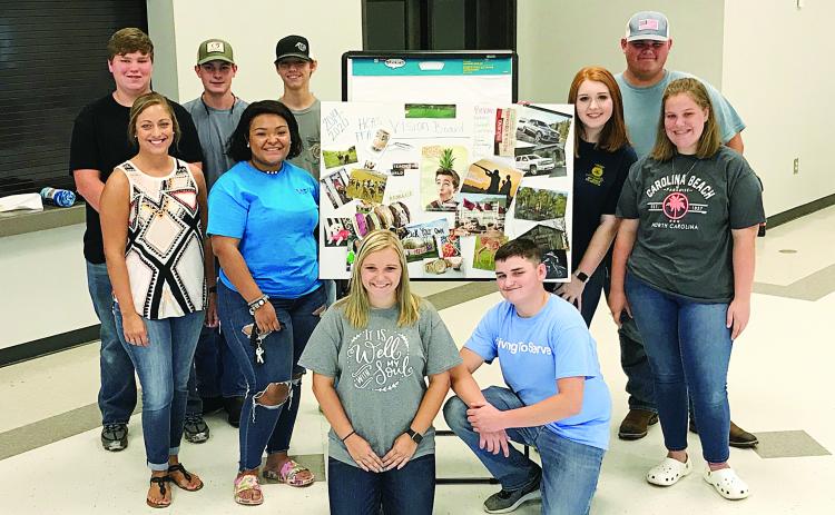 Provided photo — FFA officers show off some of their work at their summer retreat at the Hart County AgriScience Center this past summer. They are, from left to right, Jordan Teel, Anna Smith, Larson Craft, Hannah Ball, Kimberly McCall, Zachary Haygood, Bekah Stewart, Dylan Trotter and Dianna Nolan.