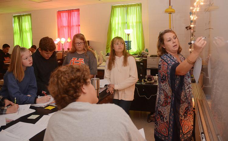 Sunshot by Michael Hall — Hart County High School science teacher shows how to convert measurements to her students on Oct. 8.