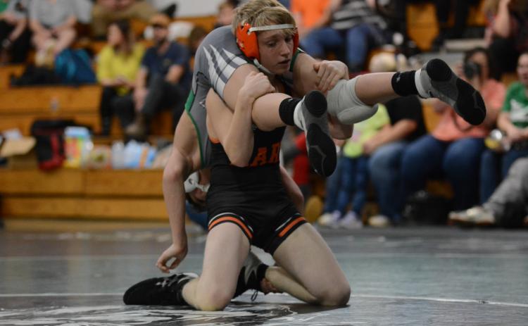 Sunshot by Grayson Williams - Hart County’s Duncan Ringer wrestles a Franklin County opponent on Tuesday in Carnesville.