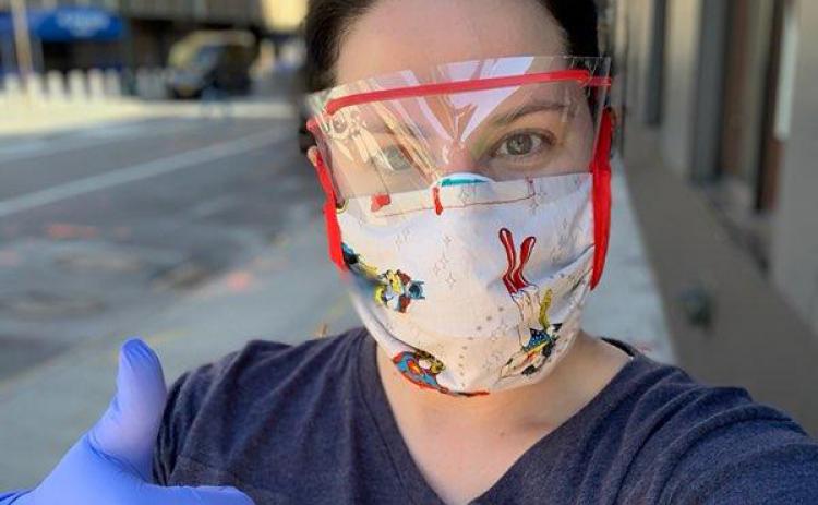  Franklin County native and nurse Joanna Davis Malcom is pictured during her recent mission to New York City to help the city’s overwhelmed hospital system during the coronavirus pandemic. Malcom is wearing a shirt made for her by Franklin County’s Paula Tyner.