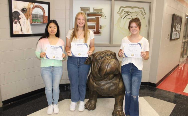 College Board National Recognition: HCHS students who are College Board National Program awardees, pictured from left to right, are Huong Pham, Cassidy Gaines, and Isabella Chitwood.
