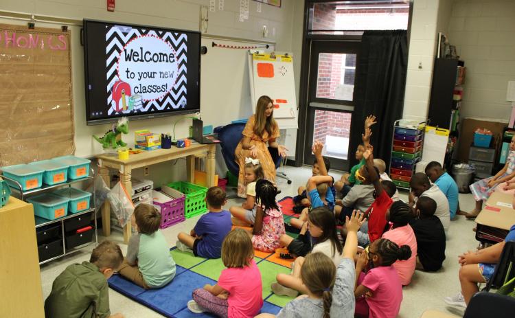 A teacher calls on students for a question during class at Hartwell Elementary. Many classrooms are expected to start having tint-control LEDs installed in the next month. 