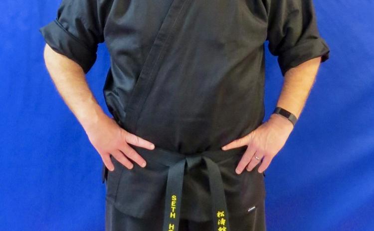 HCHS theater teacher Seth Howard earns his black belt at CMA of Hartwell in Dec. of 2022.