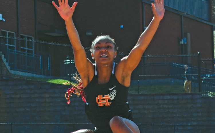 Pictured is senior Valasha Carter as she placed second in the long jump. 