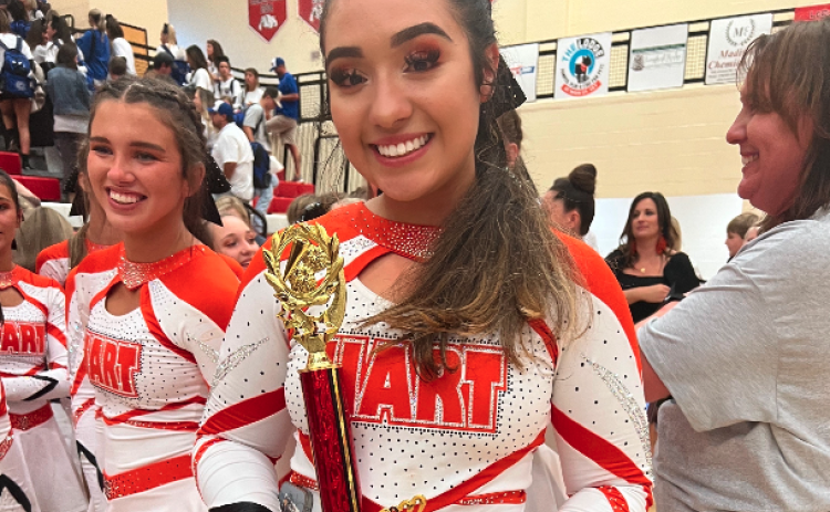 Senior competition cheerleader, Sofia Trujillo commits to Piedmont after receiving a scholarship to compete on the Lions competition cheer squad.