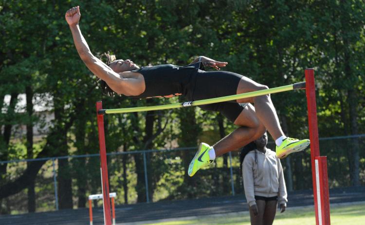 Junior Jashon Gaines advances to sectionals in the boys high jump after placing third and in the boys long jump after placing first in the GHSA Region 8-AAA meet on April 24.