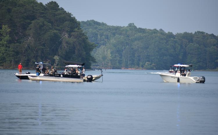 Three boats gathered around the location of where the body of 44 year-old Constantin Pascal was found late Saturday evening.