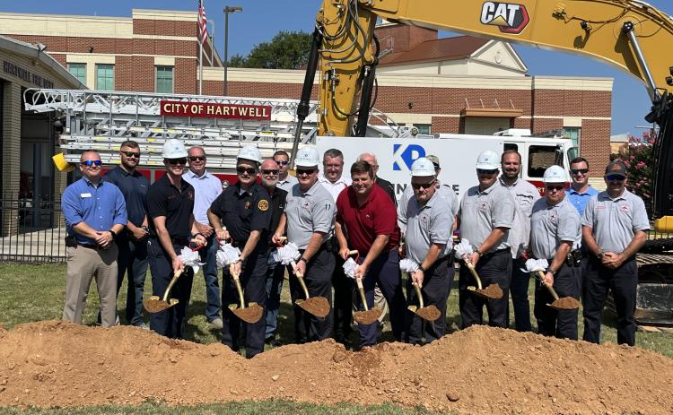 Breaking ground for the new Fire Station Project are Mayor Brandon Johnson, City Manager Jon Herschell, Fire Chief Alan Daniels, Kevin Price, President of Kevin Price Construction, Retired Fire Chief Terry Vickery, team members of Price Construction and Precision Planning Inc., and Fire Department personnel.