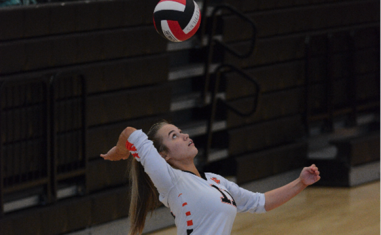 Senior Abby Hubbard serves a ball into play in their two set win over Stephens County Sept. 26, (25-7) and (25-18).