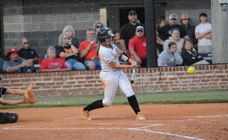 Senior outfielder Allie O’Bannon collects a hit in the 5-4 home loss to the Lady Indians of Stephens County Sept. 28.