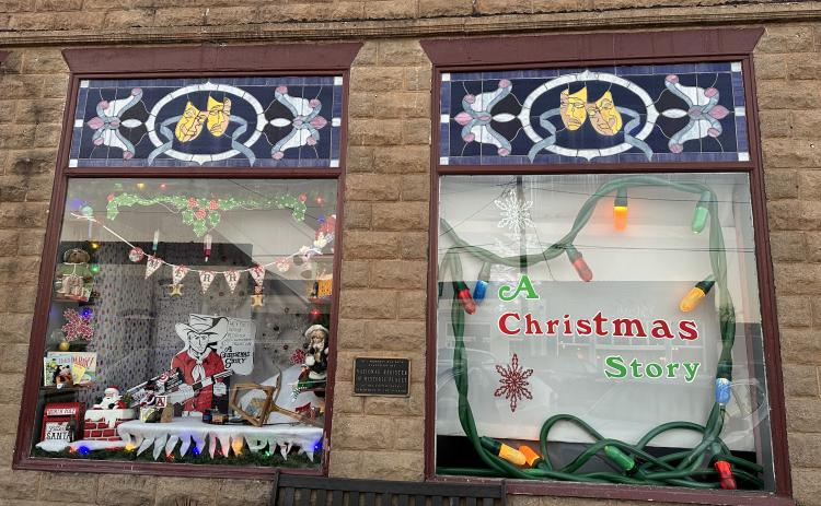 The HCCT gets its windows decorated for the upcoming production of A Christmas Story premiering Dec. 8 