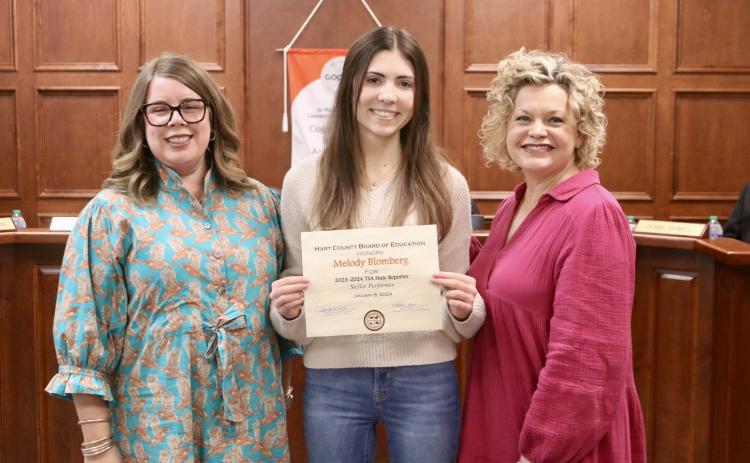 Melody Blomberg (pictured with BOE Chair Kim Pierce and Superintendent Jennifer Carter) was recognized as a Stellar Performer for being Technology Student Association (TSA) state reporter.
