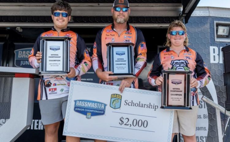 Pictured from left is Luke Schnell, Isaac Temple, and Kale Temple during the Bassmaster Junior National Championship awards ceremony where they were crowned National Champions in July of 2023. 