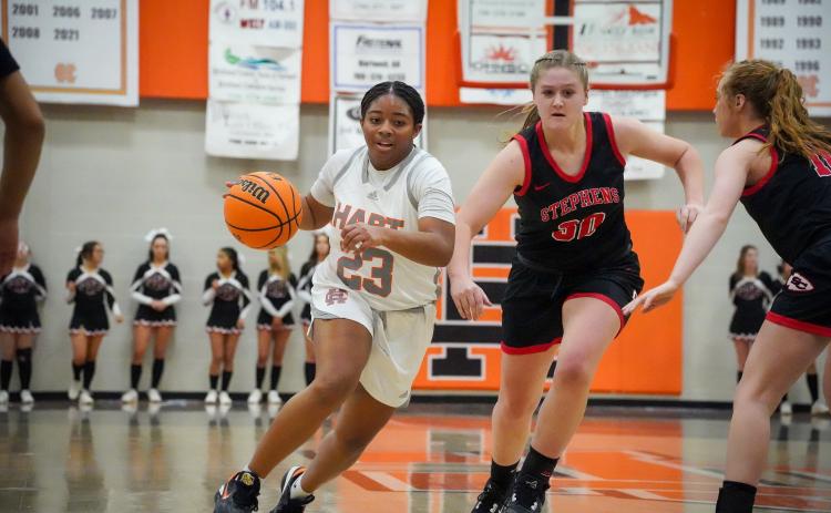 Junior guard TK Smith (23) drives into the lane as she was the co-leading scorer for the Lady Dogs with 17 points as Hart defeated the Lady Indians of Stephens County on Feb. 2, 55-43. 