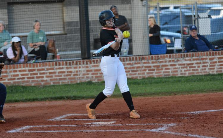 Freshman second baseman Carly Dutton goes 3-3 in the 12-6 win over East Jackson.