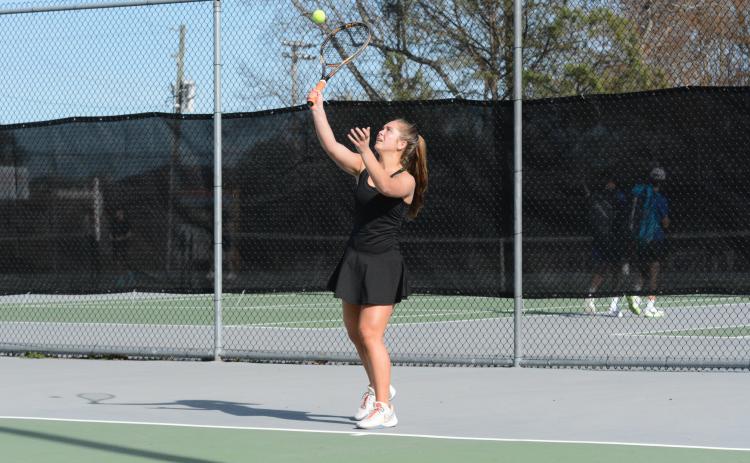 Seniors Dakota Phillips (pictured) and Hannah Harris end their career with the Racket Dogs after a 3-0 loss in the region tournament at Oconee County on April 10.