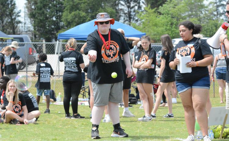 Pictured is senior athlete Jake Mitchell as he participated in the softball throw at the 2024 Special Olympics on April 17. 