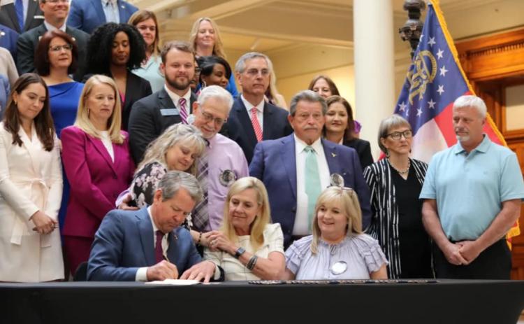 Gov. Brian Kemp signs HB 993 into law April 24 at the Georgia state Capitol. The bill was sponsored by Hartwell’s state Rep. Alan Powell. 